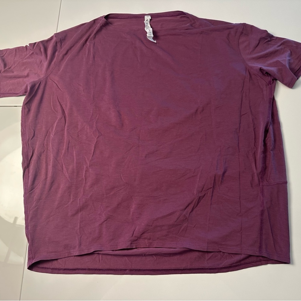 Lululemon back in action new athletic workout shirt purple size 8 short sleeve